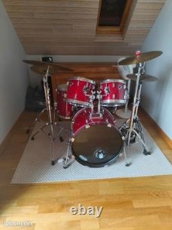 Complete acoustic drum set with stands, cymbals, and Remo Bravo II seat