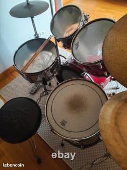 Complete acoustic drum set with stands, cymbals, and Remo Bravo II seat